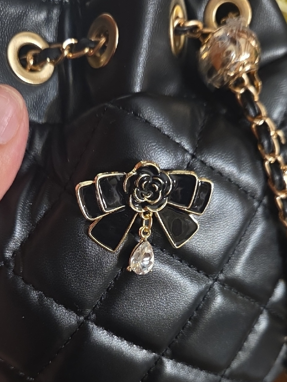 Black Quilted Bucket Bag with Floral Pins - Picture 13 of 14